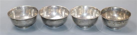 A set of four Chinese white metal bowls, diameter 8.5cm.